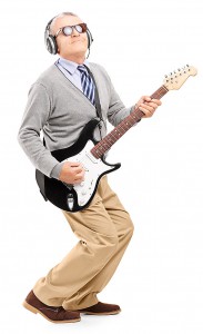 Mature Man playing guitar