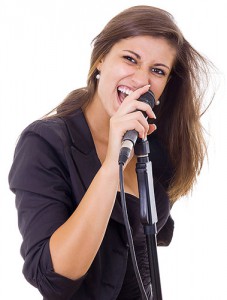 Woman-Singing-Into-Microphone-600px